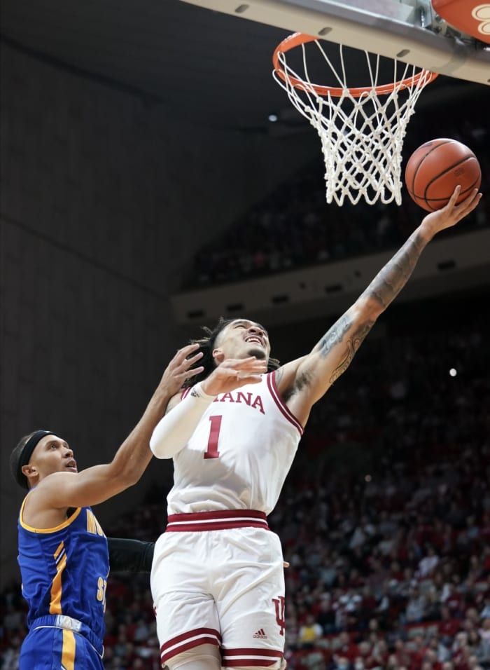 Nov 7, 2022; Bloomington, Indiana, USA; Indiana Hoosiers guard Jalen Hood-Schifino (1) attempts a shot past Morehead State Eagles guard Tucson Redding (1) during the first half at Simon Skjodt Assembly Hall.